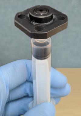 holding syringe